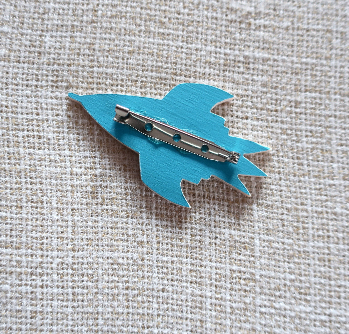Brosche 'Blaue Rakete'
